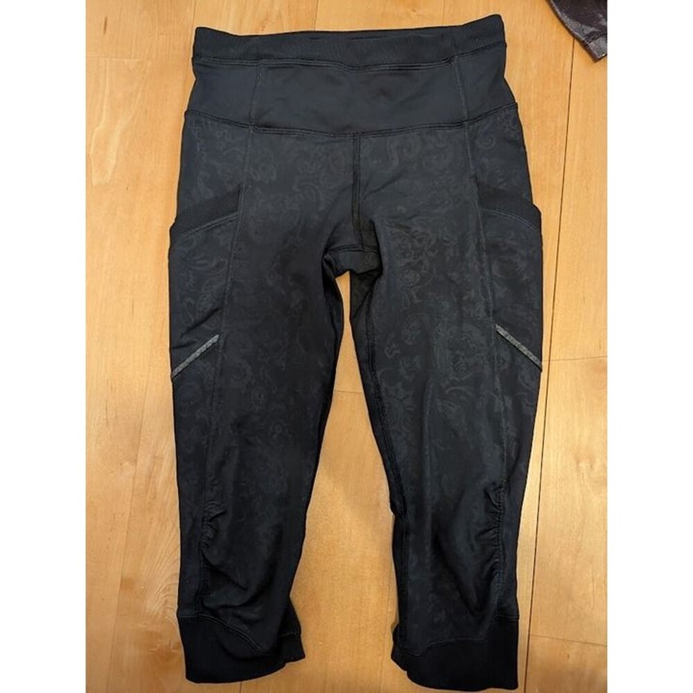 Black Lululemon crops with floral print and pockets  0 2